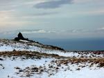 Glade How cairn with the Isle O Man on the horizon.