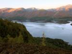 On the opposite shore of Derwent Water, the ridge rising from the right to Cat Bells , Maiden Moor  & High Spy.