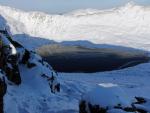Striding Edge casting it's shadow across Red Tarn. Catstycam on the right skyline.