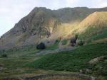 Looking back to Rainsbarrow Crag. The ridge up to Yoke takes a line to the left of the sunlit cove....interesting.
