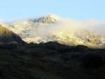 Sunlight and snow on Scafell Pike.
