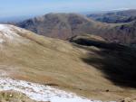 Arniston Crag partly in shadow. From Lord's Seat.