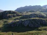 High Gait Crags on the left. The route ahead up the ridge, Pike de Bield centre skyline with Esk Pike beyond and to the left.