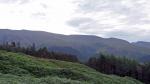 Leaving the forest and Harrop Tarn behind, and the sky is clouding over in the east.