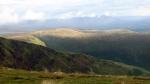 The sun on Whitecombe Head on the left.