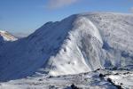 The track to Fairfield ascends the ridge near the stone wall.