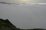 A diffuse sunrise over the inversion
