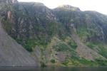 Sun touching the top of Whin Rigg across Wastwater.