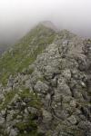 Striding Edge leading into the clouds covering Helvellyn.