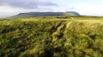 Simon Fell ahead with Ingleborough beyond.
