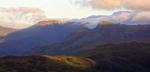 Bowfell beyond Langdale Pikes.